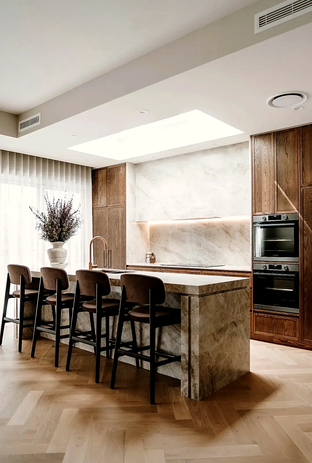 European Oak herringbone floor in designer kitchen with marble island, Bona finish by Select Timber Flooring
